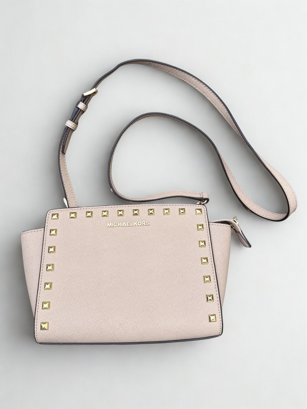 Michael Kors champagne studded crossbody hand bag